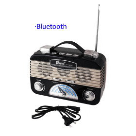 Radio  retro  negra  multibanda  recargable  con  linterna  de  leds  orientable.